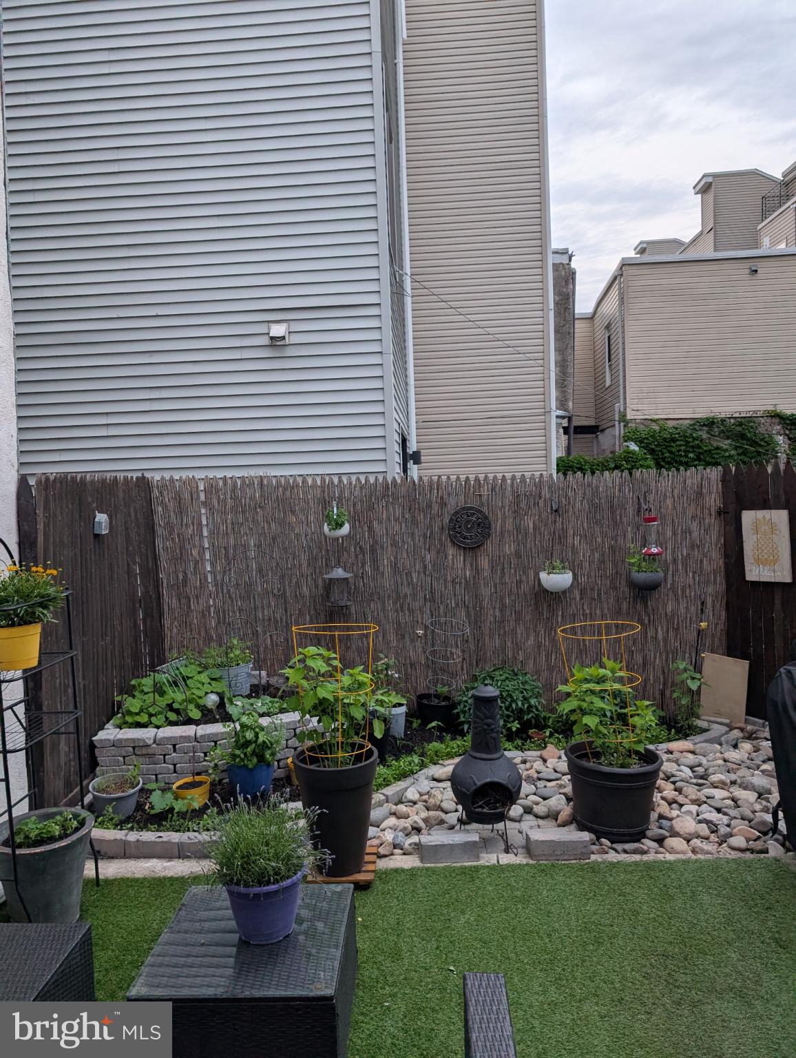 1729 Reed Street Philadelphia, PA 19146 - Photo 5 of 6 a view of a garden with a chair