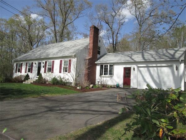 57 Crest Road Monson, MA 01057 - Photo 1 of 19 a front view of a house with a garden