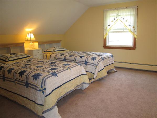 57 Crest Road Monson, MA 01057 - Photo 11 of 19 a spacious bedroom with a bed and window