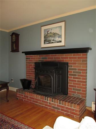 57 Crest Road Monson, MA 01057 - Photo 16 of 19 a living room with furniture and a fireplace