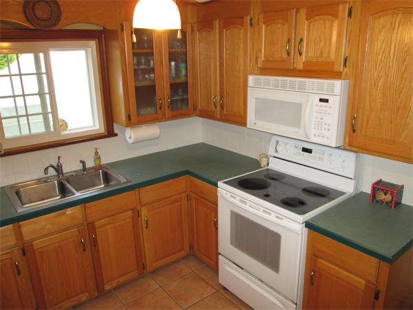 57 Crest Road Monson, MA 01057 - Photo 3 of 19 a kitchen that has a sink and a stove