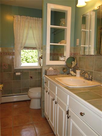 57 Crest Road Monson, MA 01057 - Photo 8 of 19 a bathroom with a sink a toilet and shower