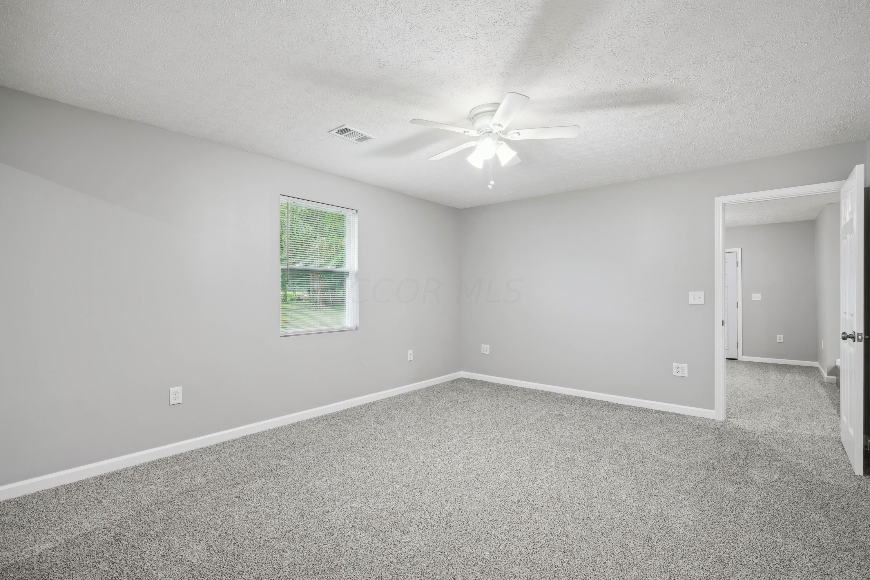 6705 Johnson Road Galloway, OH 43119 - Photo 14 of 30 Primary Bedroom with on-suite bath and huge walk-in closet!