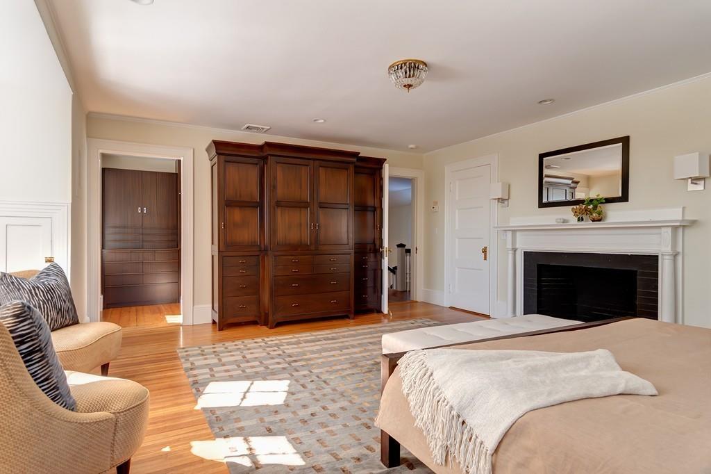67 Longfellow Road Wellesley, MA 02481 - Photo 16 of 26 a bed room with a bed and a television