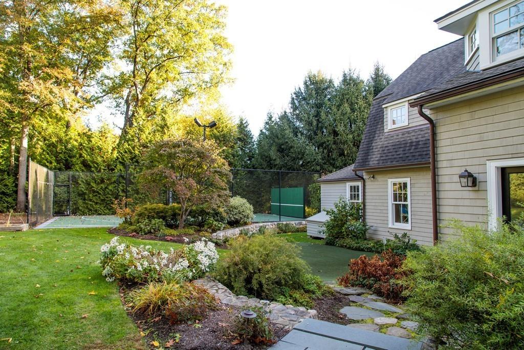 67 Longfellow Road Wellesley, MA 02481 - Photo 23 of 26 a view of backyard with garden and plants
