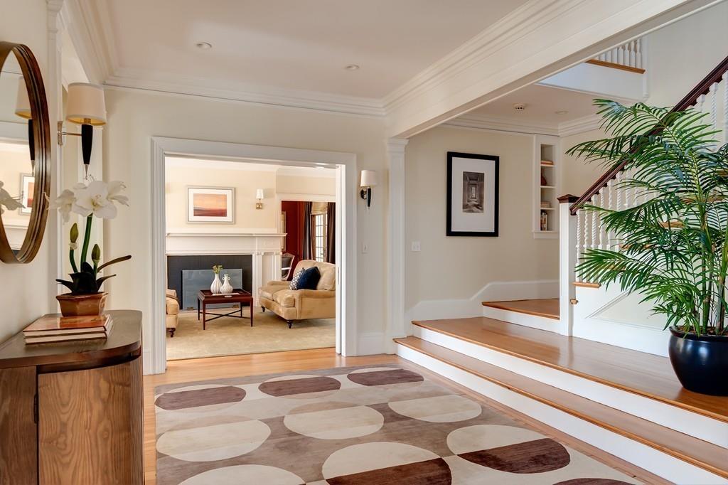 67 Longfellow Road Wellesley, MA 02481 - Photo 3 of 26 a living room with furniture and a fireplace