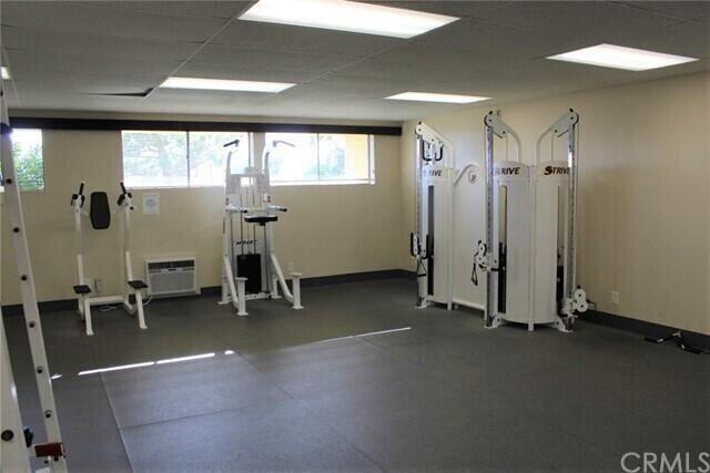74711 Dillon Road, Unit 331 Desert Hot Springs, CA 92241 - Photo 45 of 53 a view of a room with gym equipment