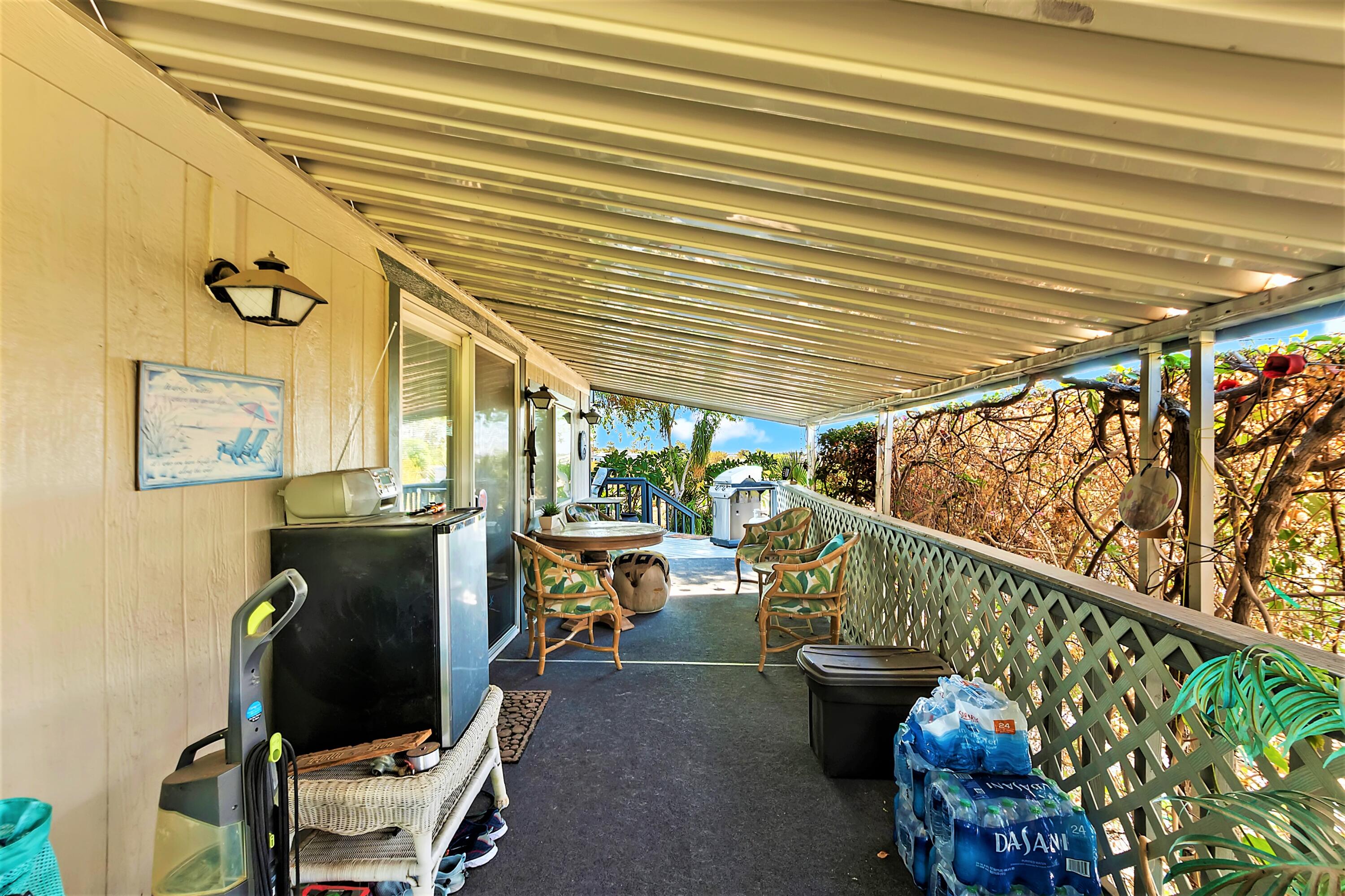 74711 Dillon Road, Unit 331 Desert Hot Springs, CA 92241 - Photo 5 of 53 a view of a porch with furniture