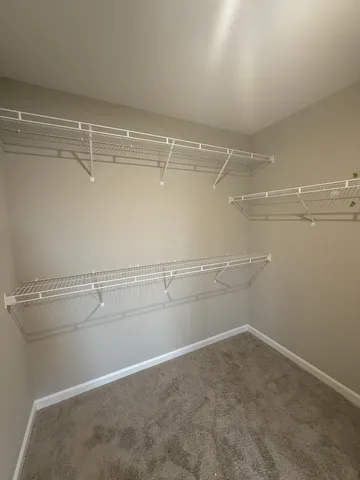 a view of a room with racks on the wall