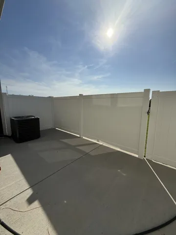 an empty room with wooden floor