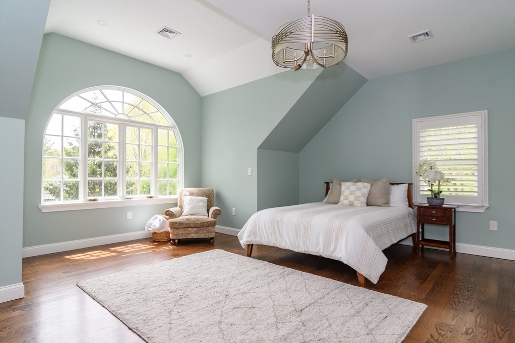 1098 Webster Street Needham, MA 02492 - Photo 14 of 21 a bedroom with a large bed and a window