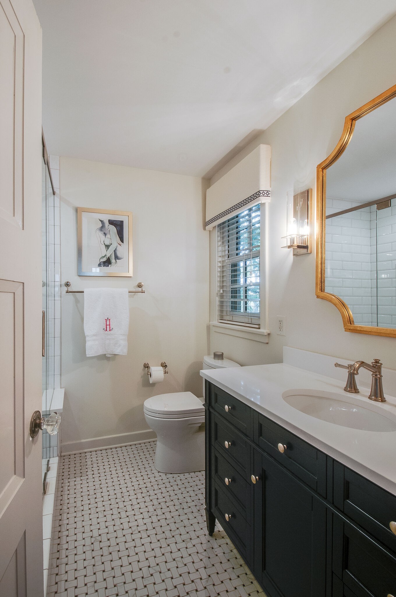4602 Benton Smith Road Nashville, TN 37215 - Photo 20 of 36 a bathroom with a sink a toilet and a mirror