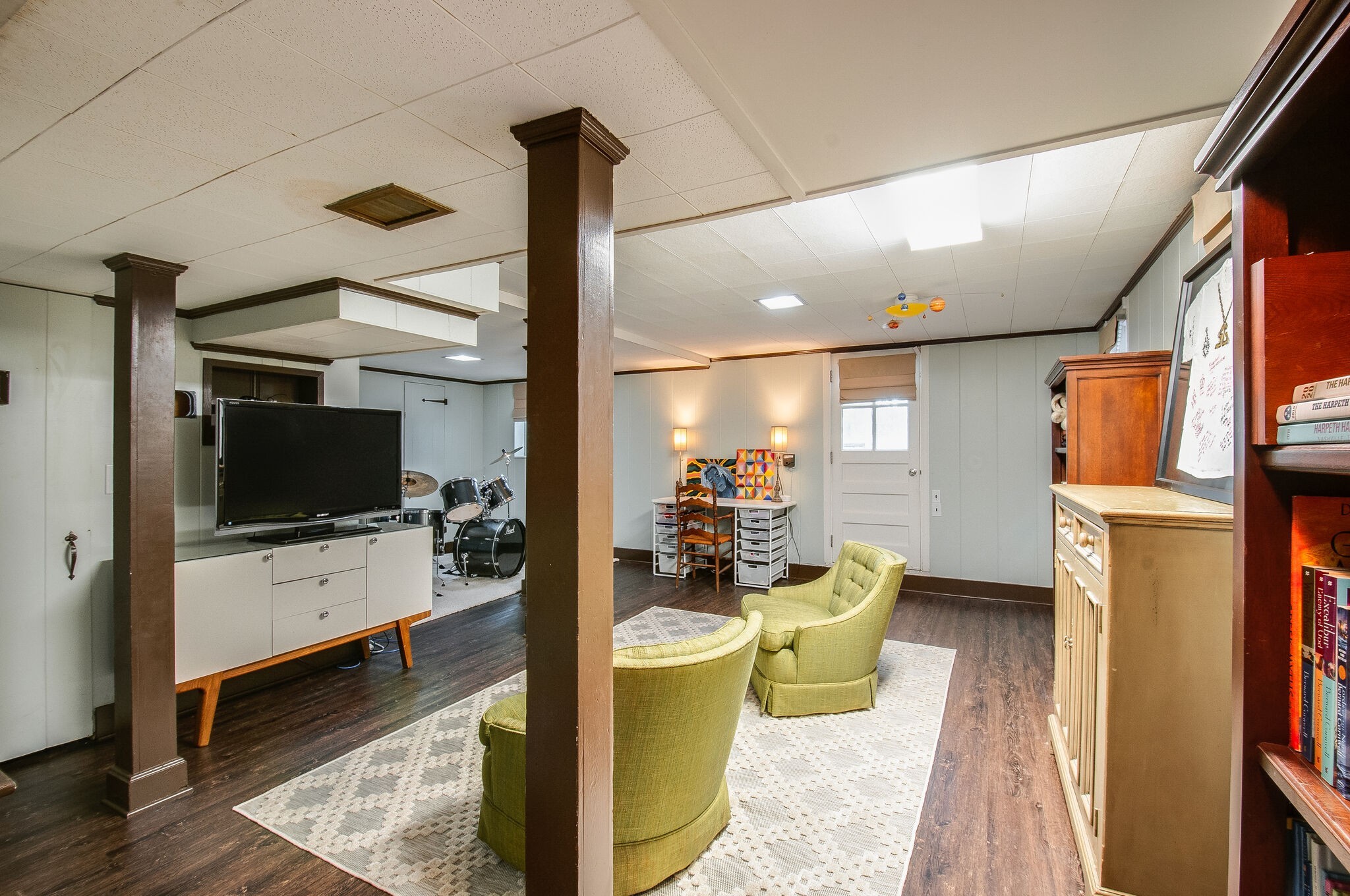 4602 Benton Smith Road Nashville, TN 37215 - Photo 28 of 36 a living room with furniture and a flat screen tv