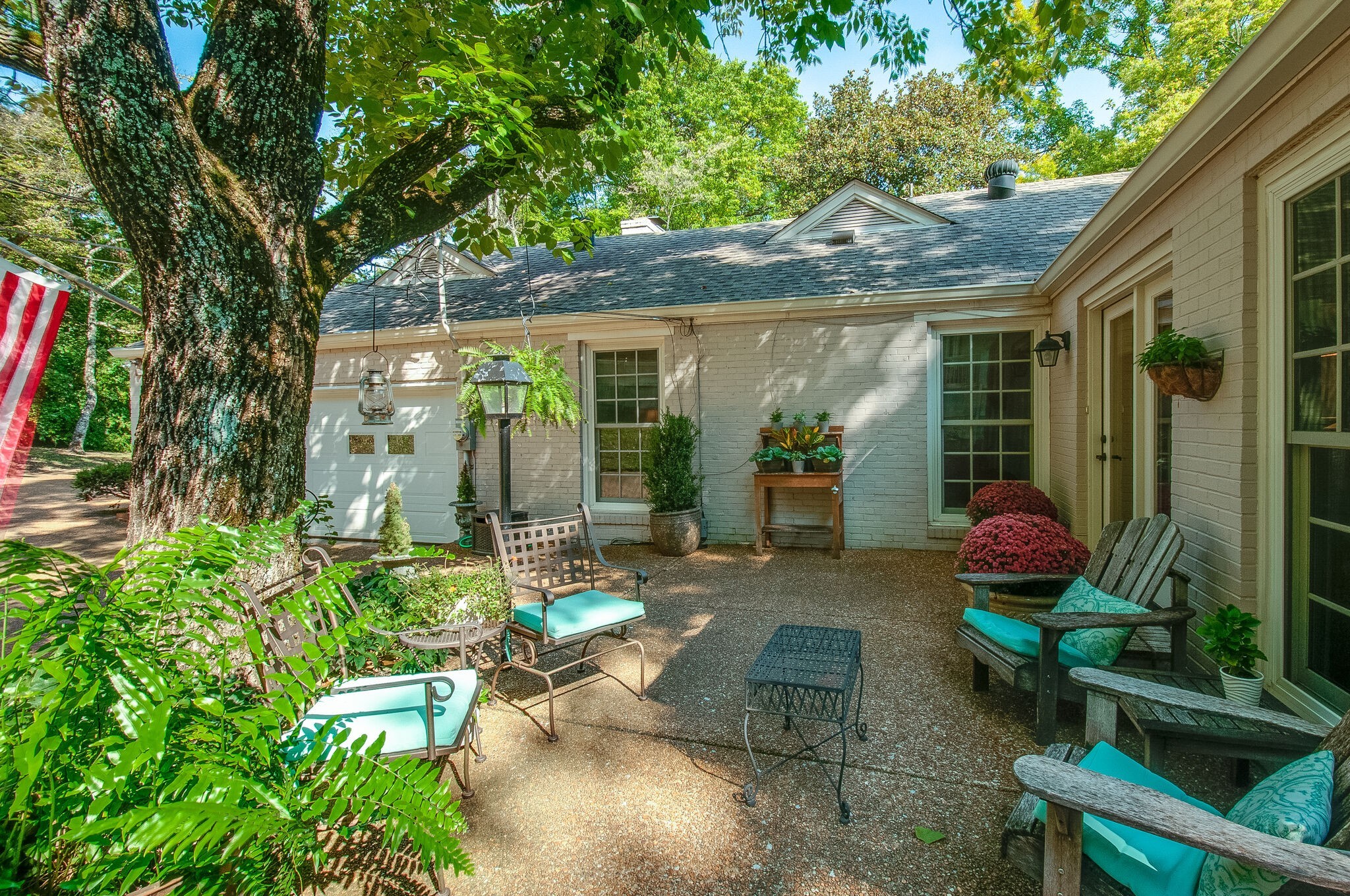 4602 Benton Smith Road Nashville, TN 37215 - Photo 34 of 36 a backyard of a house with outdoor seating