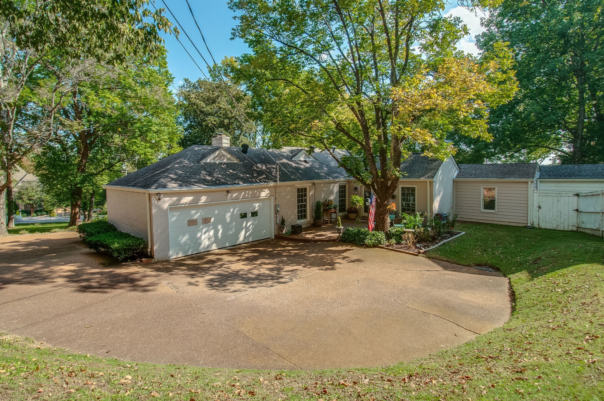 4602 Benton Smith Road Nashville, TN 37215 - Photo 36 of 36 a view of a house with a tree in the background