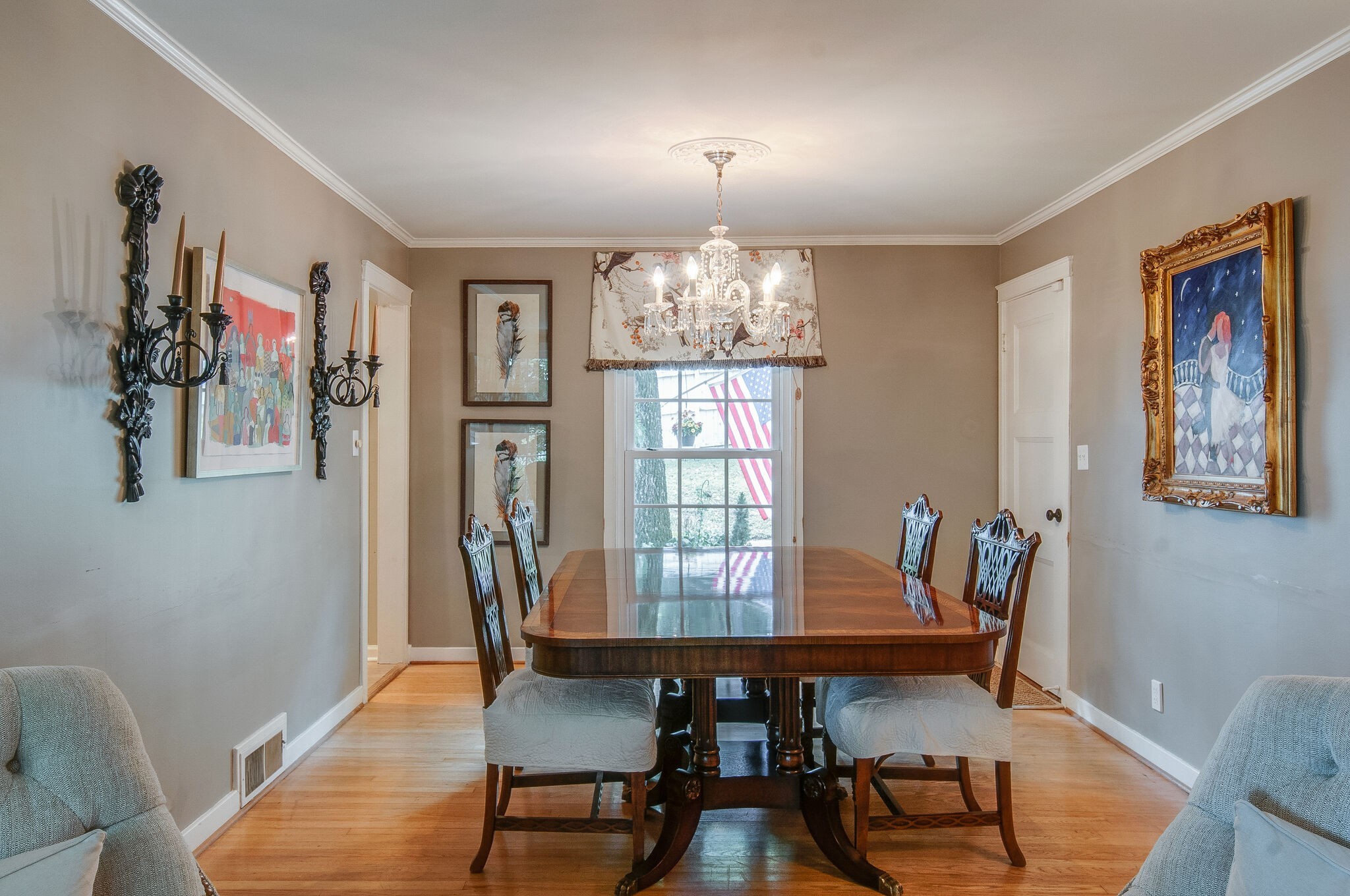 4602 Benton Smith Road Nashville, TN 37215 - Photo 10 of 36 a view of a dining room with furniture wooden floor and chandelier