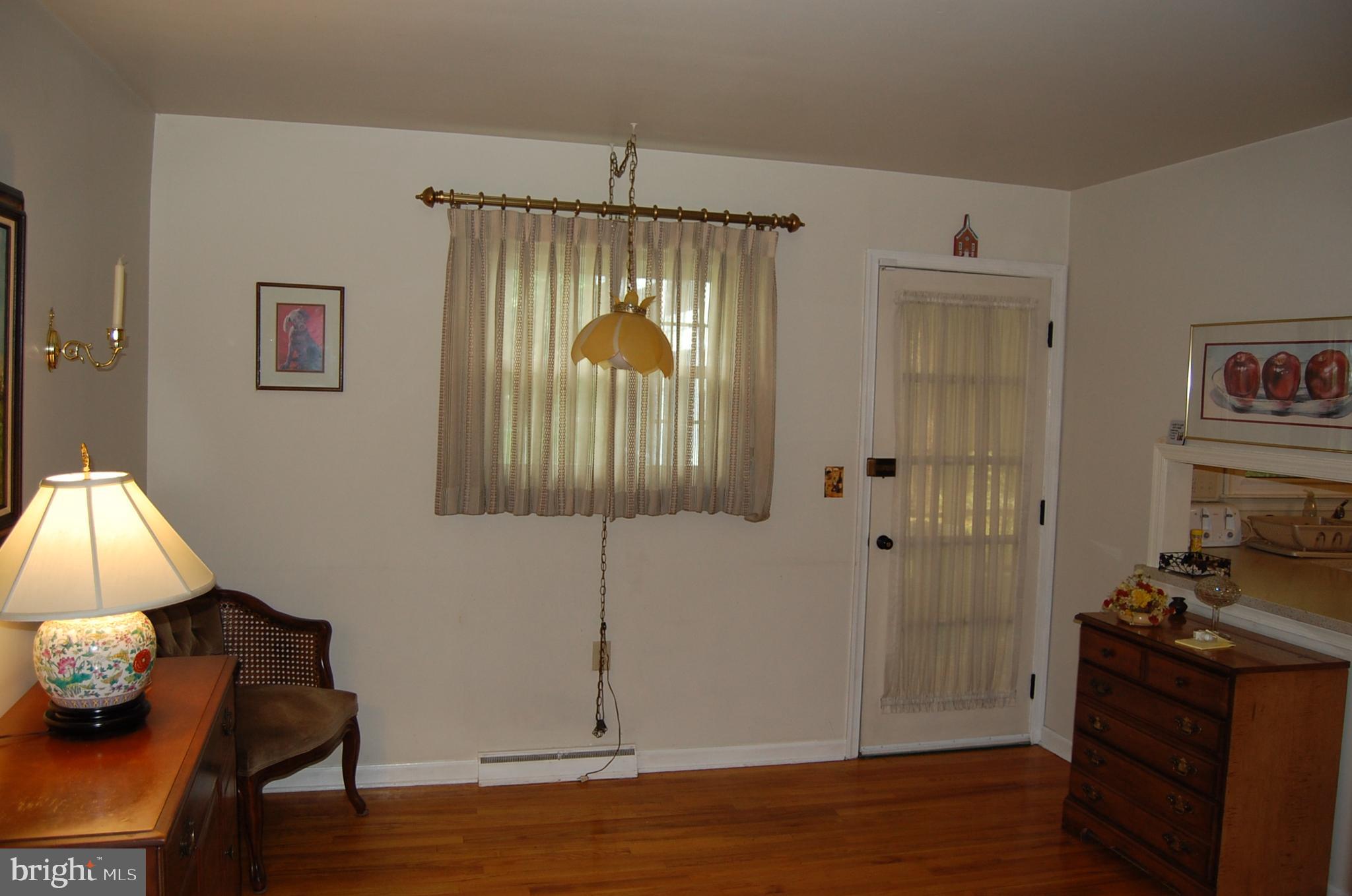 553 Woodsedge Road Dover, DE 19904 - Photo 12 of 26 Breakfast Area Door to Back Porch