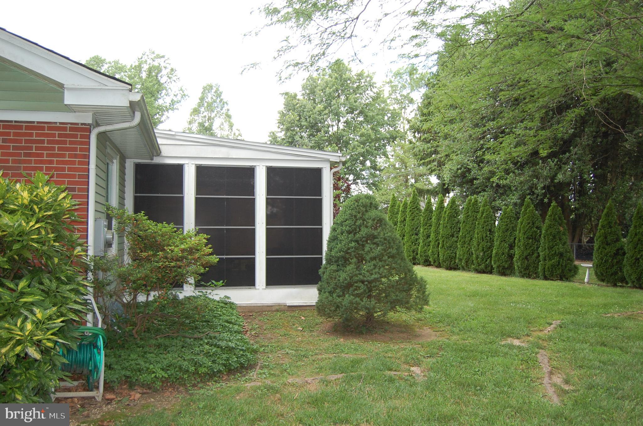553 Woodsedge Road Dover, DE 19904 - Photo 4 of 26 Back three season porch