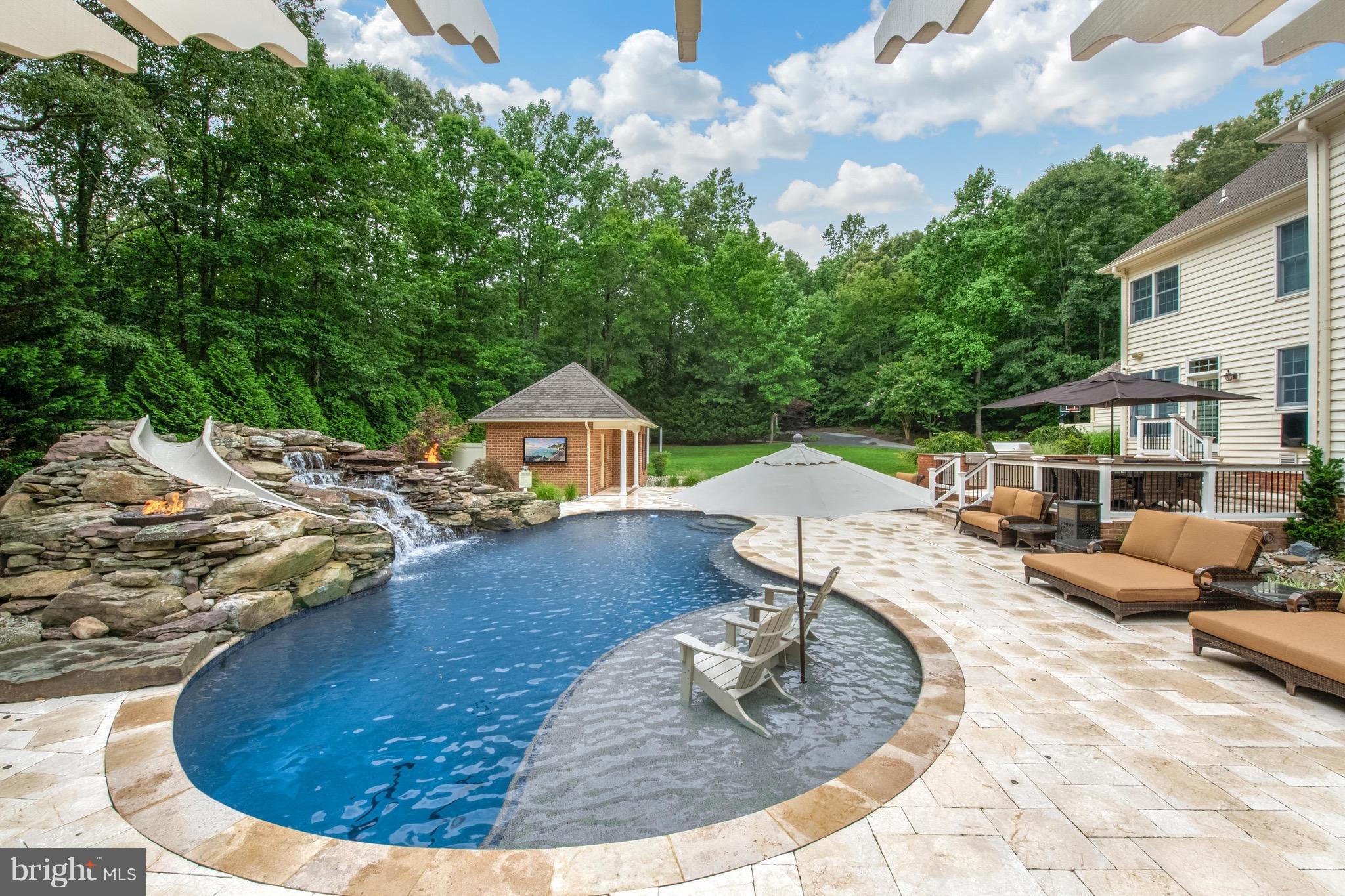697 St George Barber Road Davidsonville, MD 21035 - Photo 3 of 30 Pool with waterfall, 2 firebowls and slide