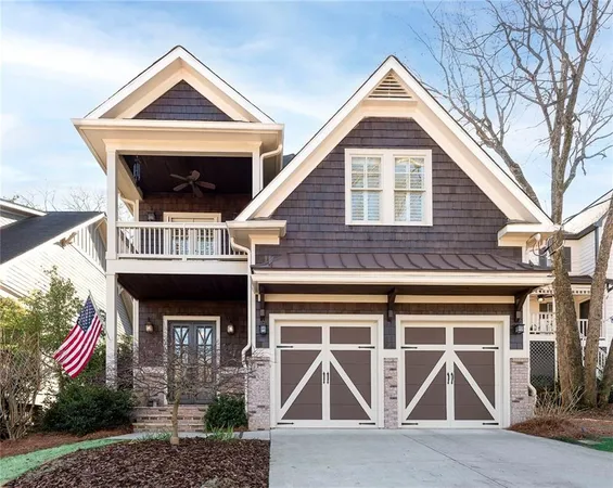 a front view of a house with garage