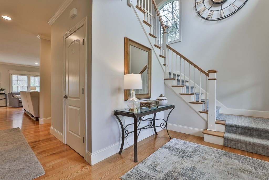 3 Dolan Drive, Unit 3 Middleton, MA 01949 - Photo 6 of 34 a view of entryway dining room and hall with wooden floor