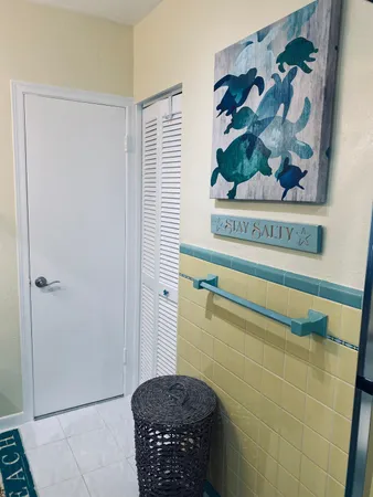 a bathroom with a bathtub and shower