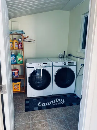 a bathroom with a toilet and a sink