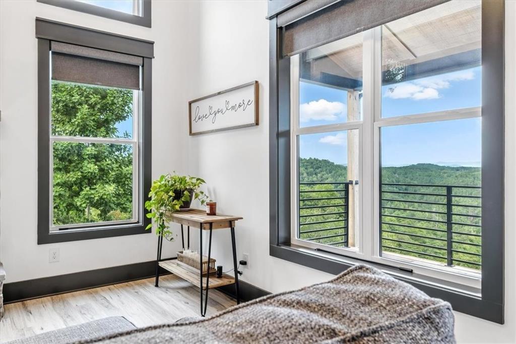 1379 Foxhound Trail Northeast Ranger, GA 30734 - Photo 11 of 42 a view of a workspace with a window and chair
