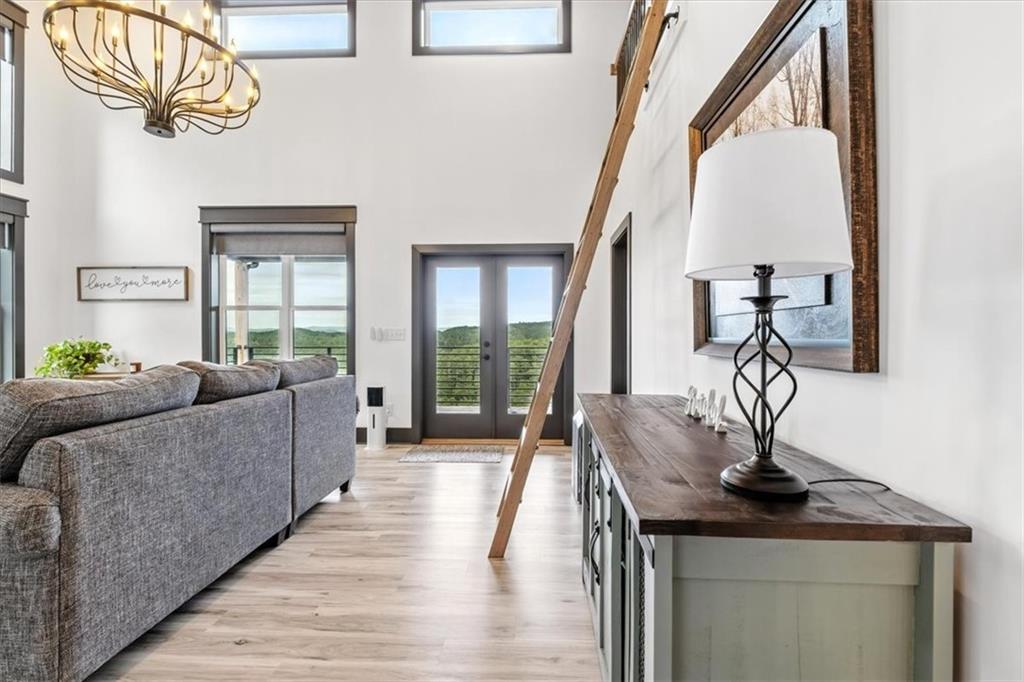1379 Foxhound Trail Northeast Ranger, GA 30734 - Photo 13 of 42 a living room with furniture and a window