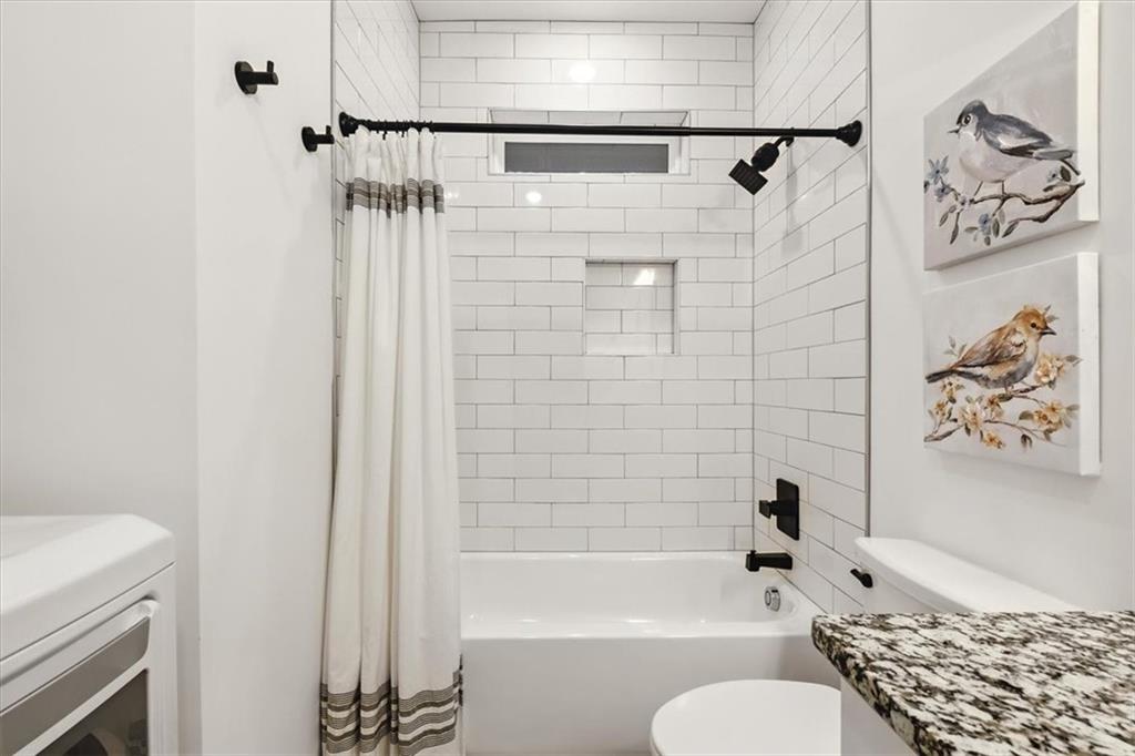 1379 Foxhound Trail Northeast Ranger, GA 30734 - Photo 24 of 42 a bathroom with a bathtub and shower