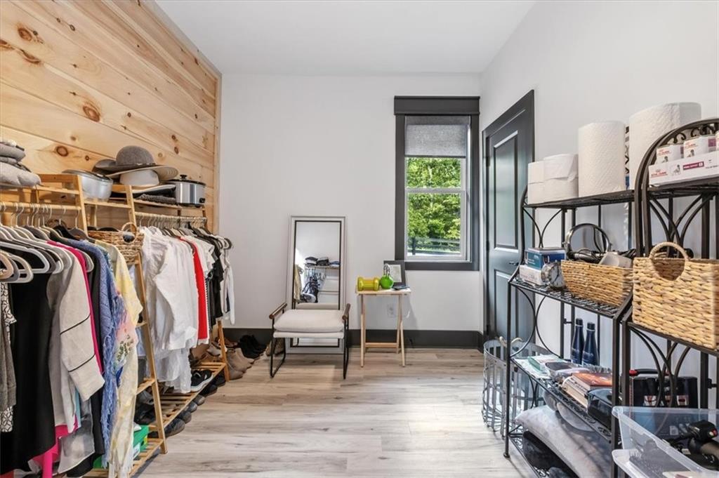 1379 Foxhound Trail Northeast Ranger, GA 30734 - Photo 27 of 42 a view of a hallway with wooden floor and windows