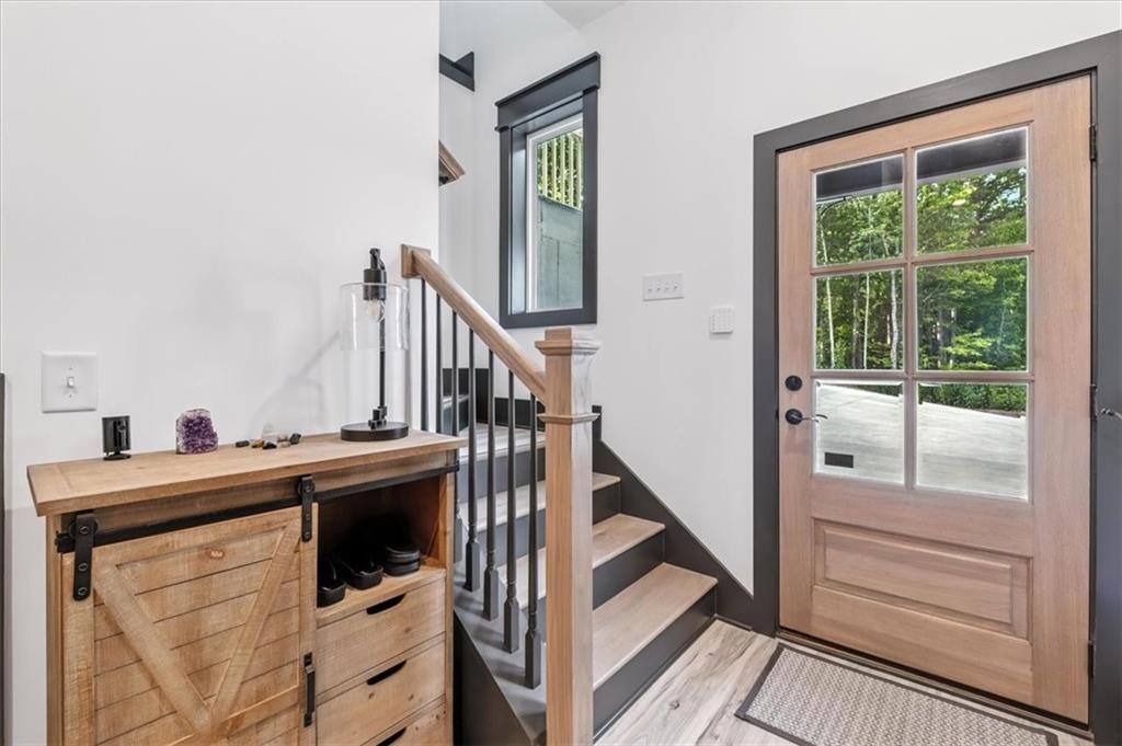 1379 Foxhound Trail Northeast Ranger, GA 30734 - Photo 29 of 42 a view of a hallway with washer and dryer