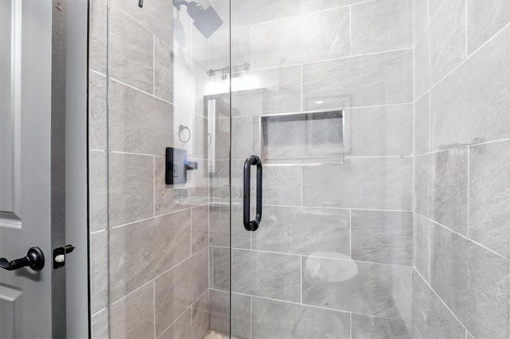 1379 Foxhound Trail Northeast Ranger, GA 30734 - Photo 35 of 42 a bathroom with a shower