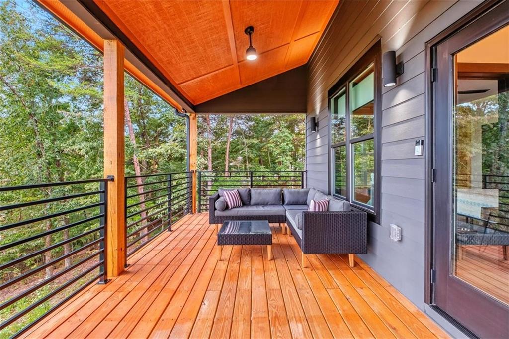 1379 Foxhound Trail Northeast Ranger, GA 30734 - Photo 37 of 42 a balcony with wooden floor
