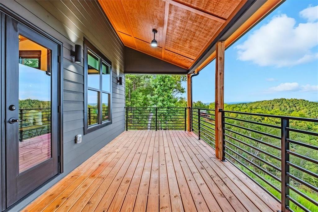 1379 Foxhound Trail Northeast Ranger, GA 30734 - Photo 38 of 42 a view of porch with wooden floor