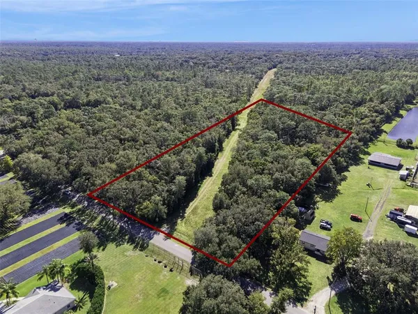 an aerial view of a city with lots of residential buildings