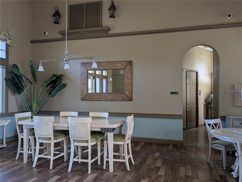 1200 Canopy Walk Lane, Unit 1235 Palm Coast, FL 32137 - Photo 19 of 37 a dining room with furniture and window