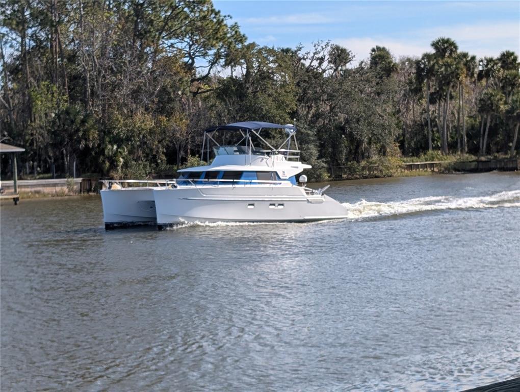 1200 Canopy Walk Lane, Unit 1235 Palm Coast, FL 32137 - Photo 30 of 37 a view of a yard with slide