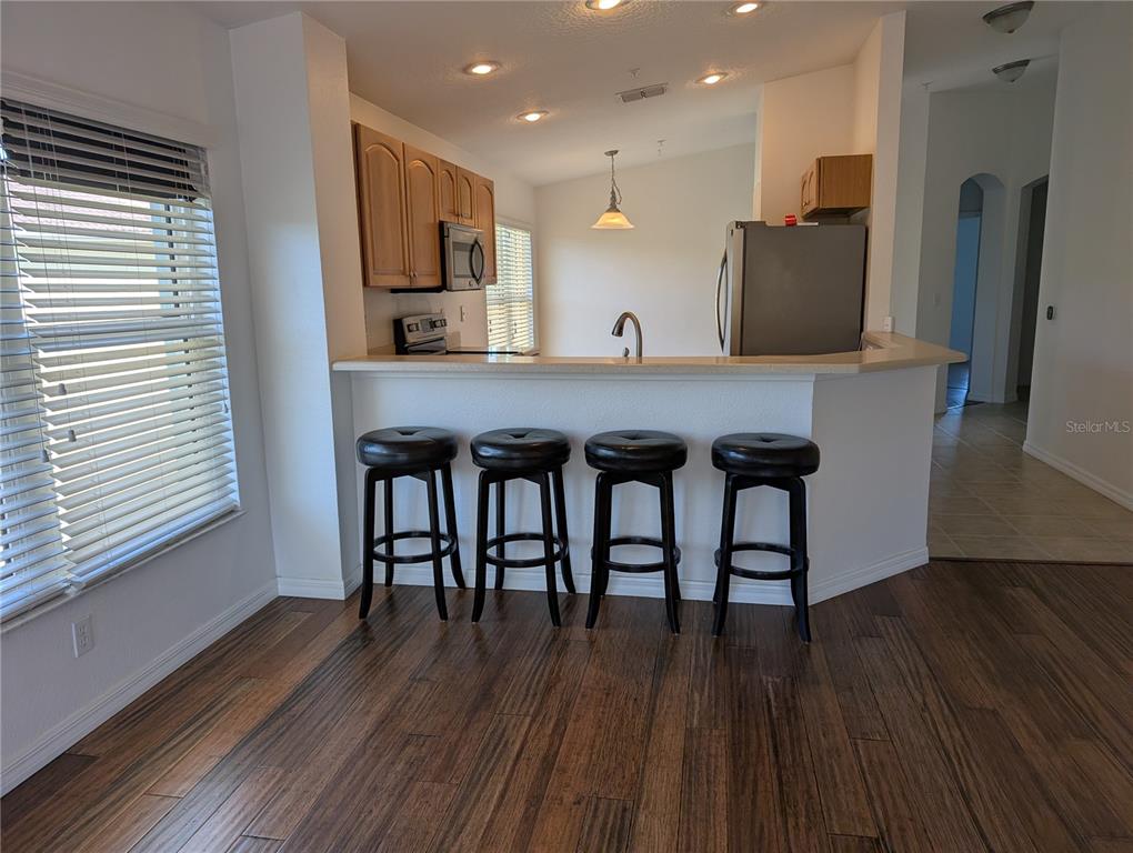 1200 Canopy Walk Lane, Unit 1235 Palm Coast, FL 32137 - Photo 5 of 37 a view of kitchen with breakfast area
