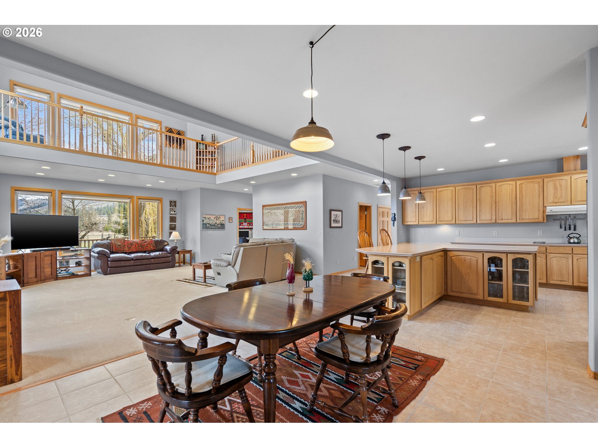 54693 Bingham Road Adams, OR 97810 - Photo 19 of 48 a view of a dining room with furniture and a large window
