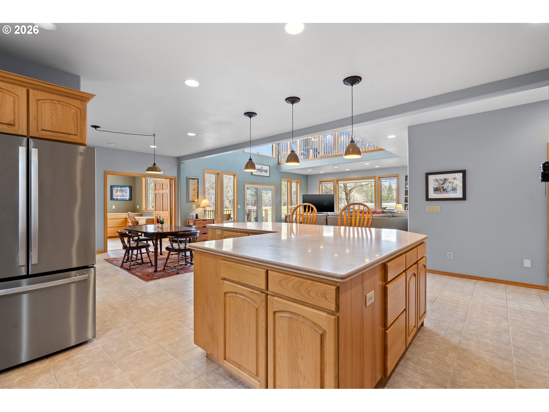 54693 Bingham Road Adams, OR 97810 - Photo 23 of 48 a kitchen with stainless steel appliances granite countertop a sink a stove and a refrigerator