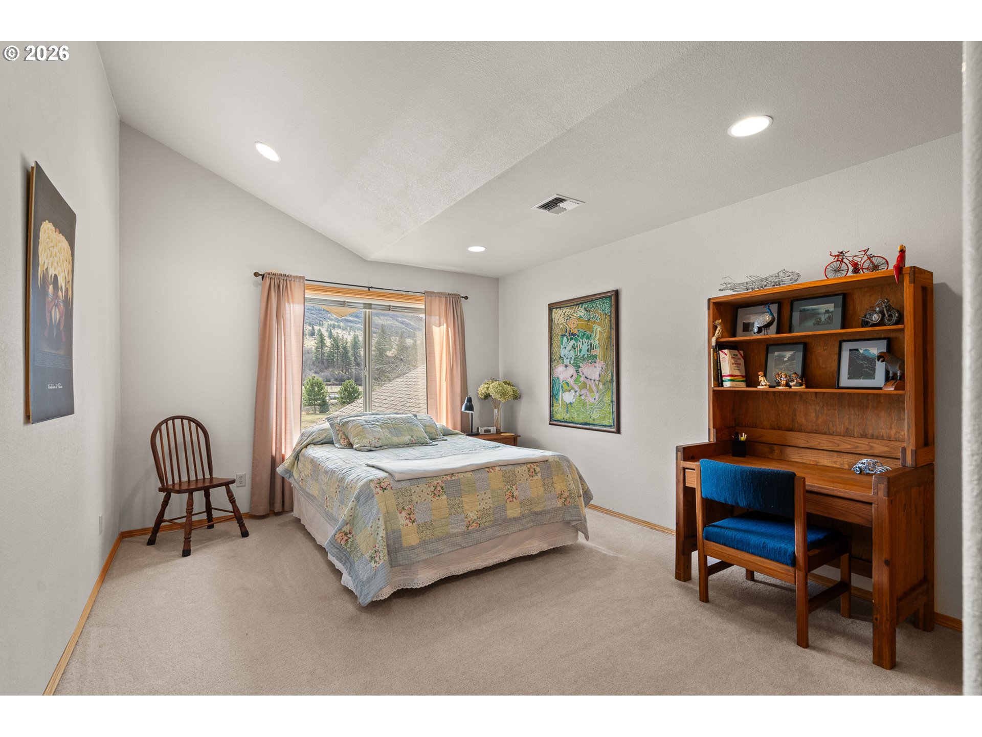 54693 Bingham Road Adams, OR 97810 - Photo 36 of 48 a bedroom with a bed a table and a large window