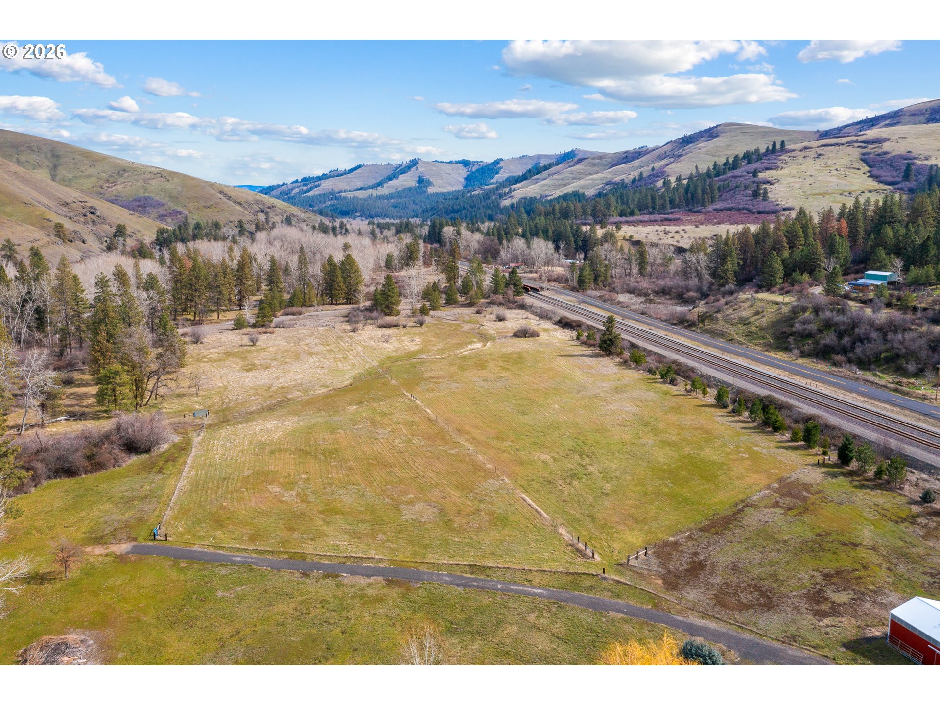 54693 Bingham Road Adams, OR 97810 - Photo 7 of 48 a view of a swimming pool with a yard