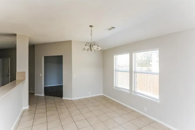 a view of an empty room with window