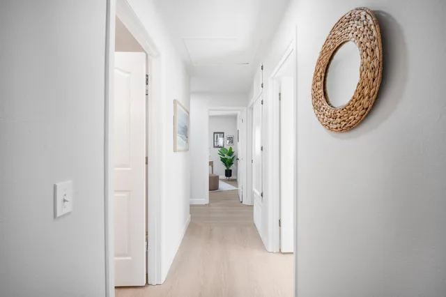 a kitchen with a sink stainless steel appliances and cabinets