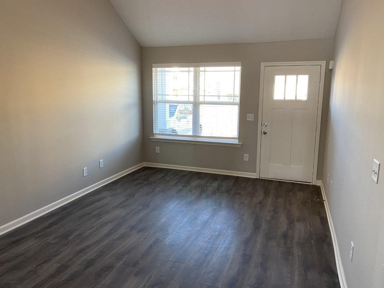 130 Rising Lane, Unit 130 Gallatin, TN 37066 - Photo 4 of 8 an empty room with wooden floor and windows