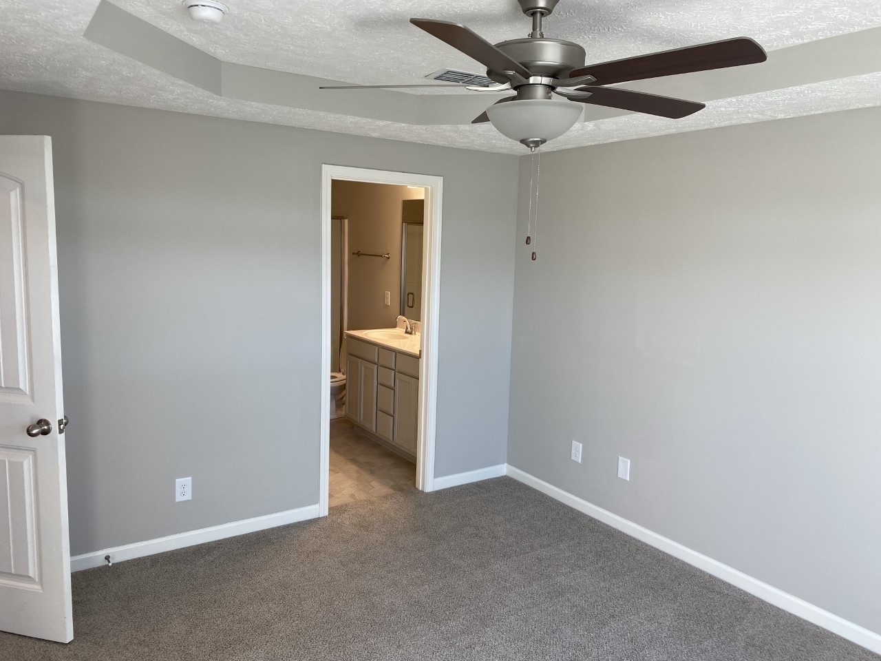 130 Rising Lane, Unit 130 Gallatin, TN 37066 - Photo 5 of 8 a view of an empty room and a ceiling fan window