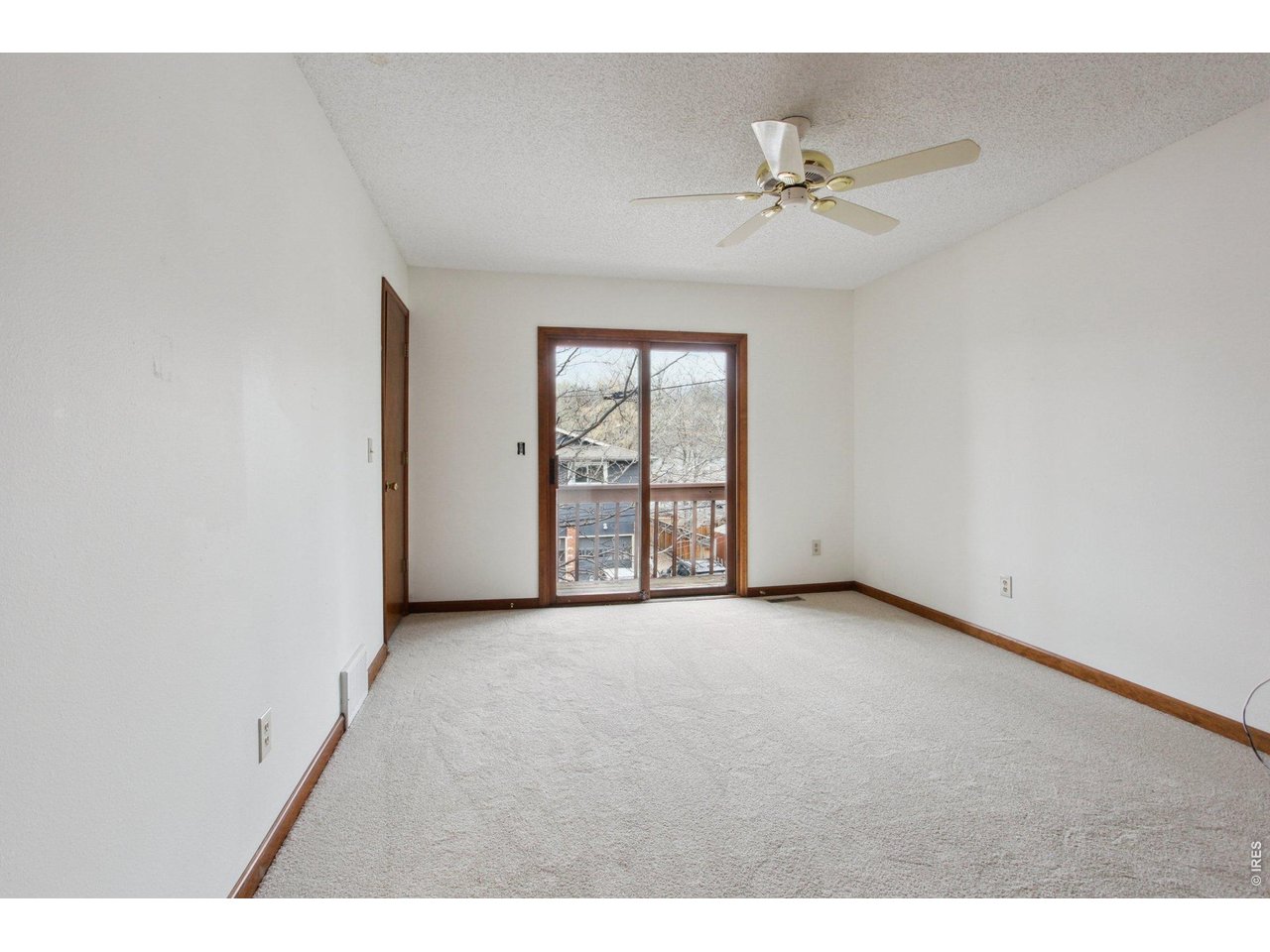 2651 9th Street Boulder, CO 80304 - Photo 11 of 25 a view of a livingroom with a ceiling fan and window