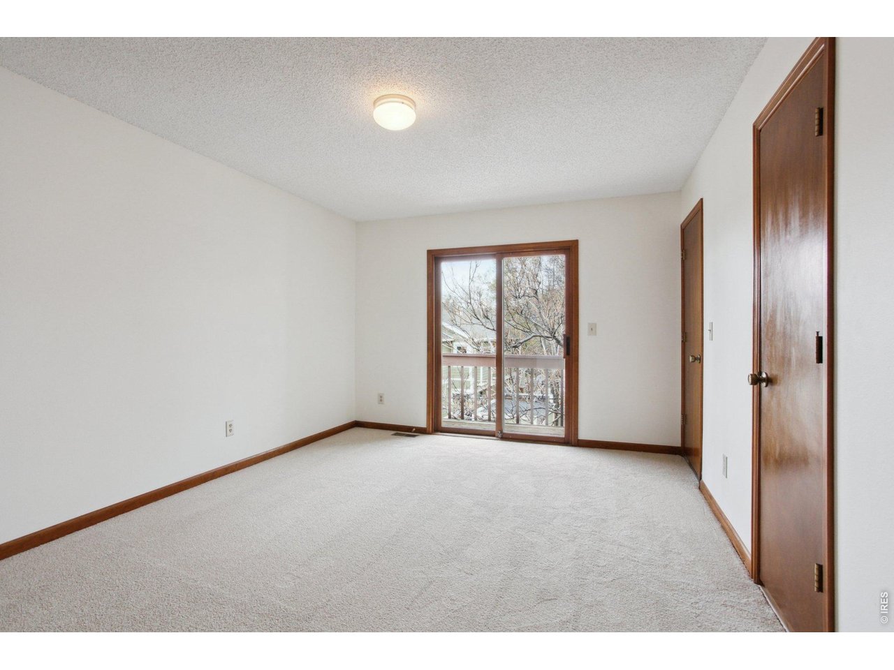 2651 9th Street Boulder, CO 80304 - Photo 14 of 25 a view of an empty room with a window