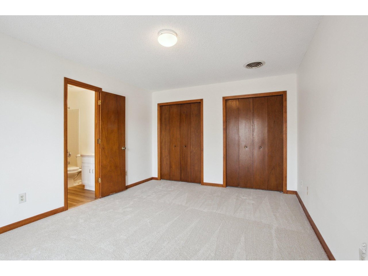 2651 9th Street Boulder, CO 80304 - Photo 15 of 25 a view of an empty room with wooden floor